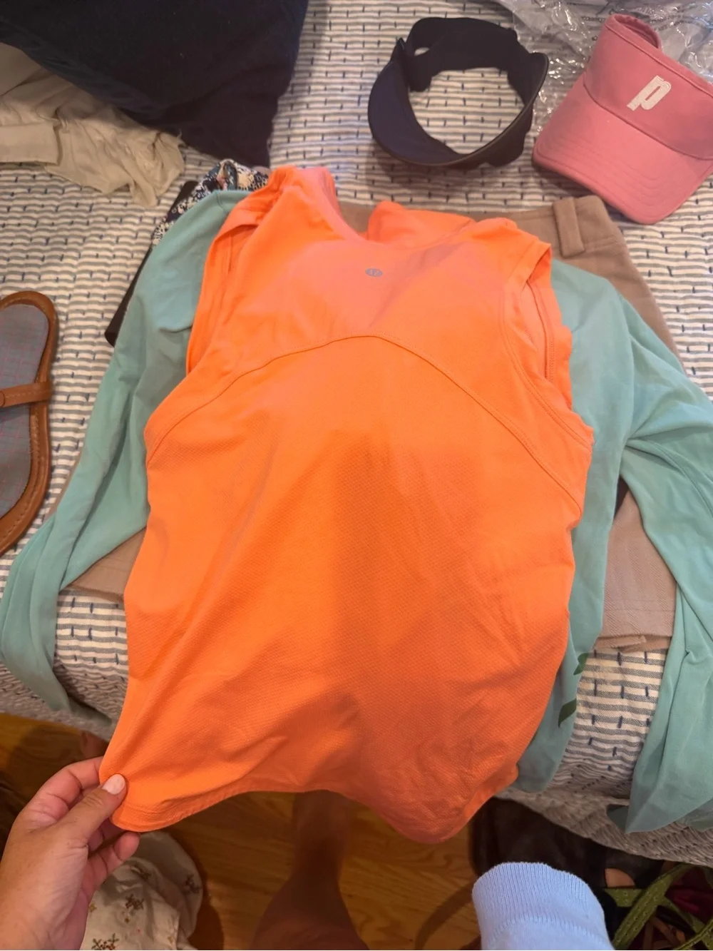 Lululemon gold or tennis polo Orange Sleeveless Golf Polo with White Logo